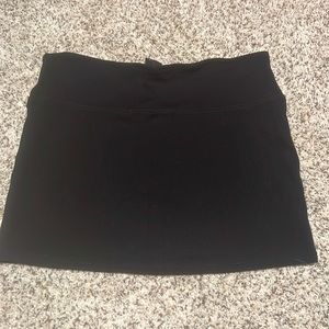 Black Urban Outfitters mini skirt.